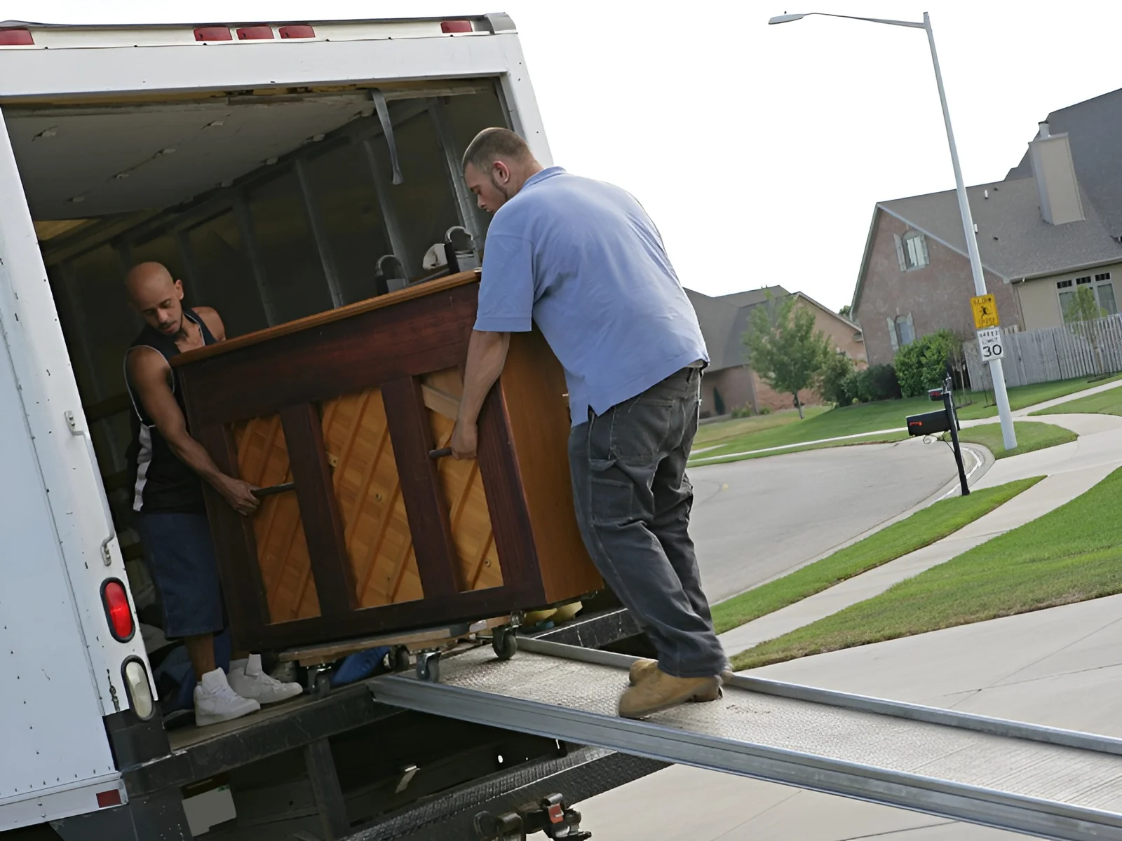 Image showing movers handling heavy piano.